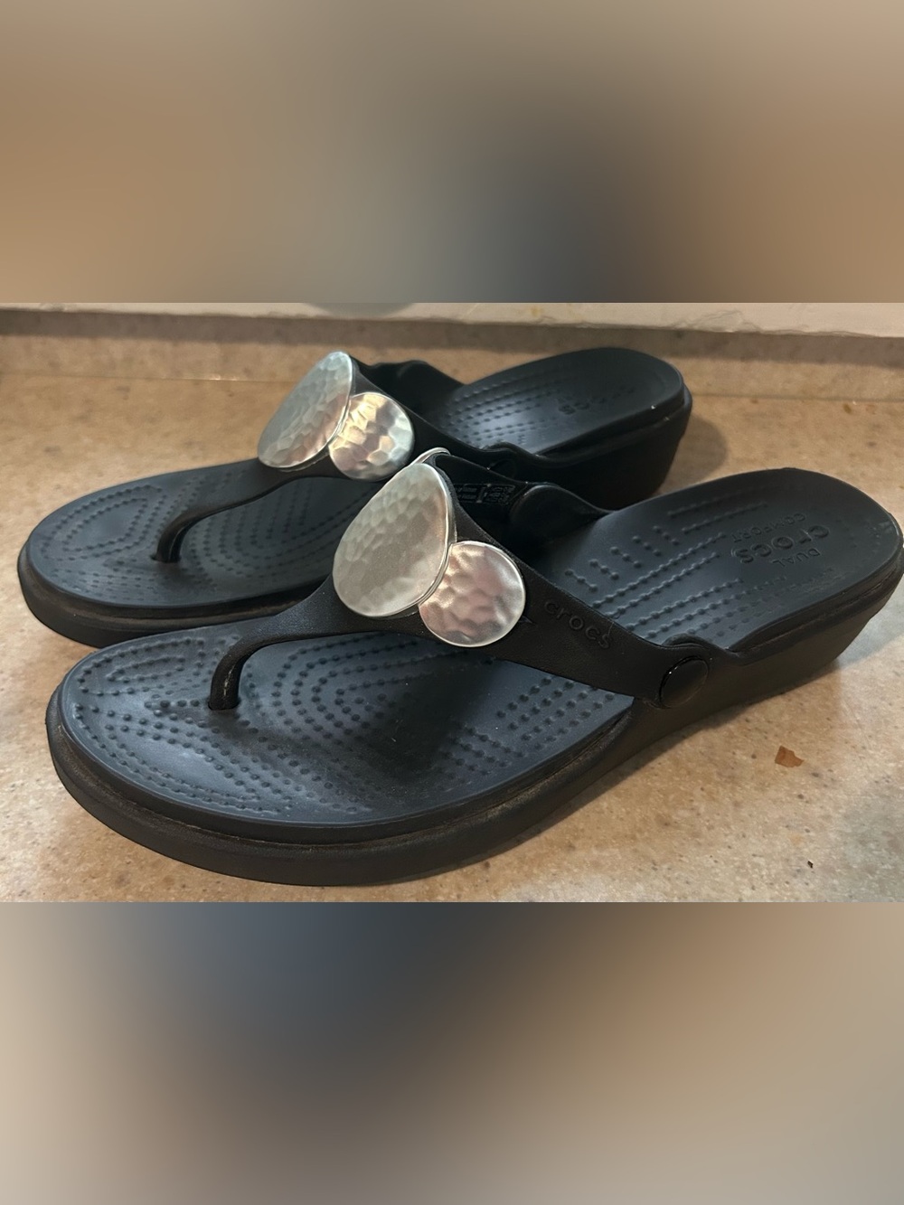 CROCS Black Wedge Flip Sandals with Silver Disc Embellishments